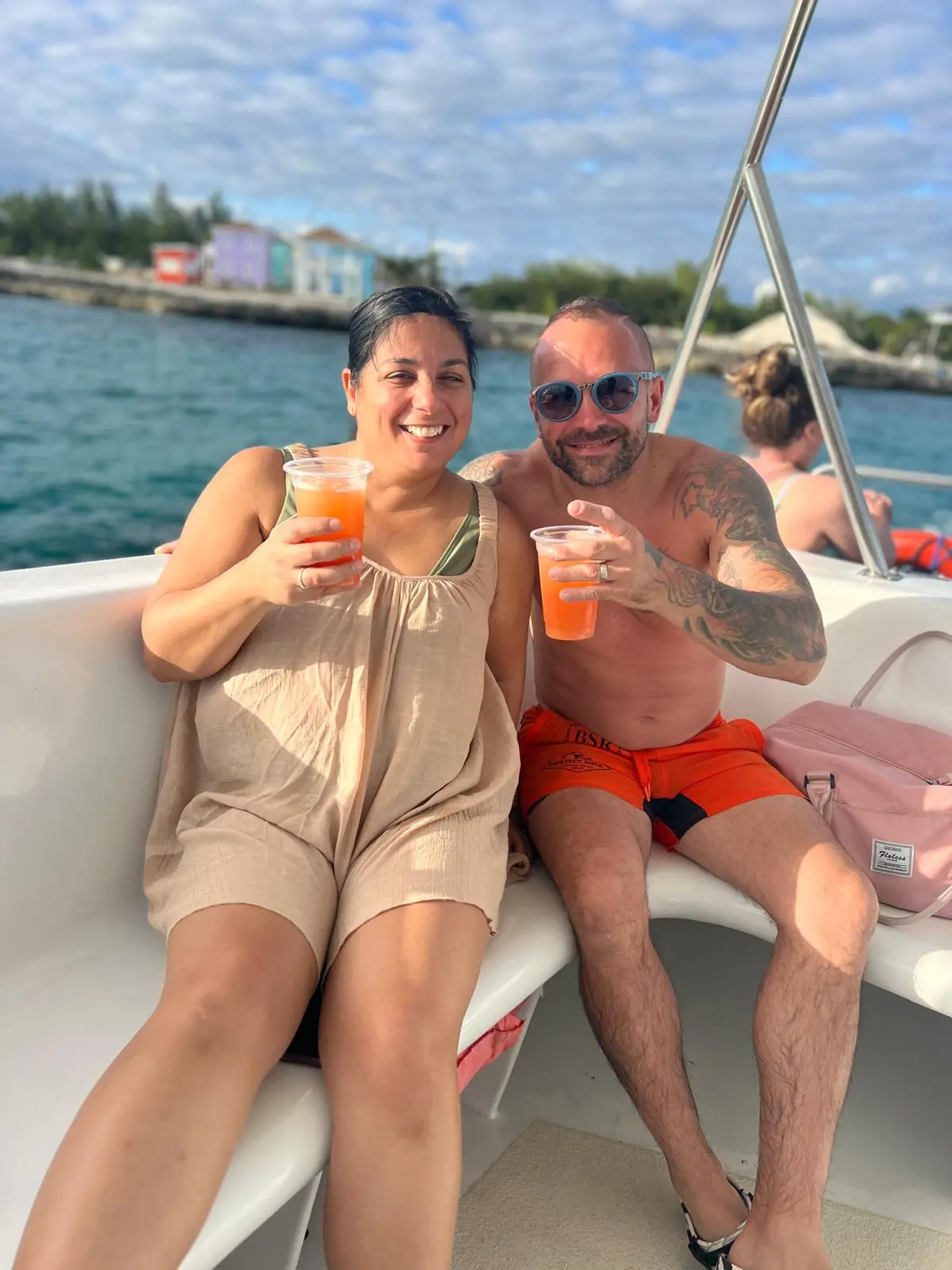 Couple enjoying their Seas N' Cays catamaran day trip off Nassau, Bahamas