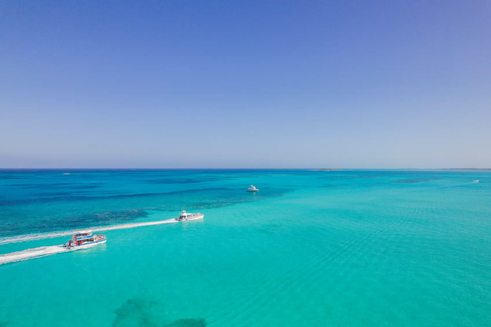 Aerial view of the secluded Rose Island beach used for beach weddings